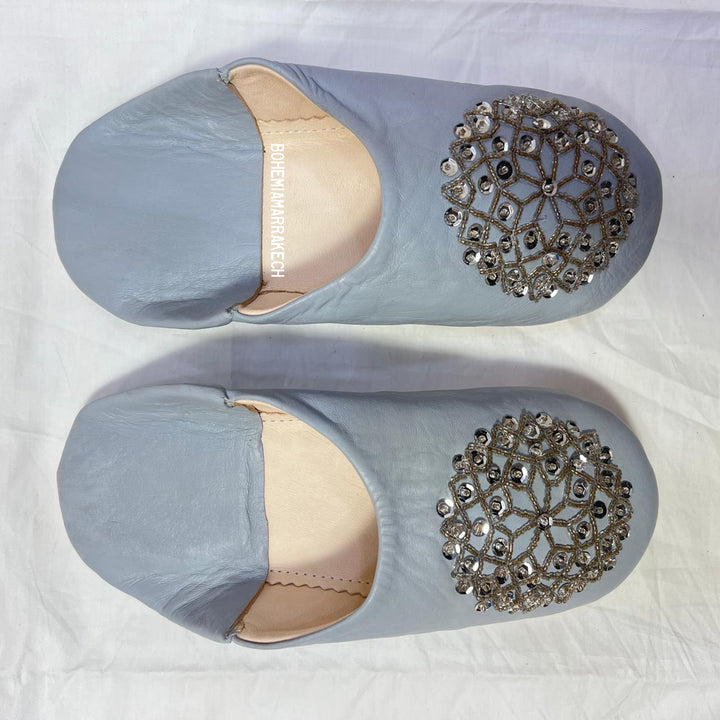 Traditional pointed Moroccan babouche slippers made from natural leather.