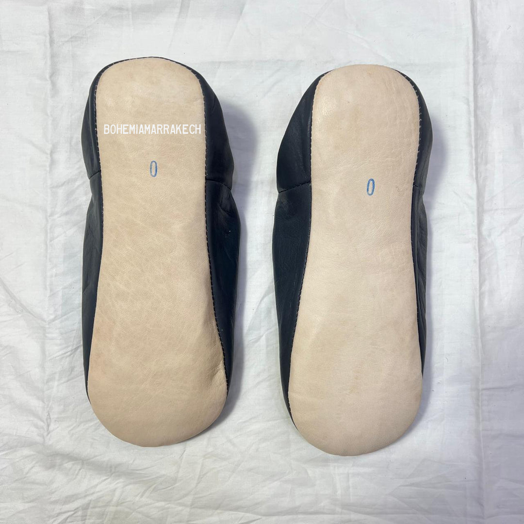Handcrafted leather Moroccan babouche slippers in a classic pointed design.