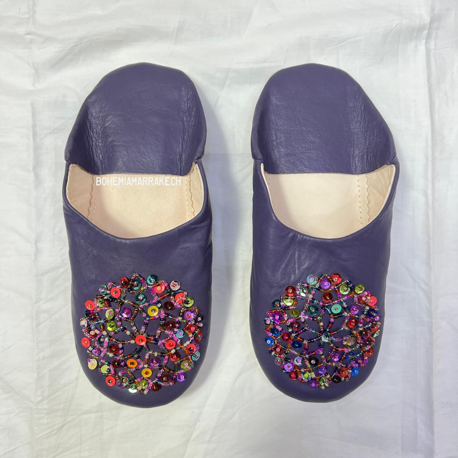 “Minimalist handmade Moroccan leather babouche slippers for indoor wear.”