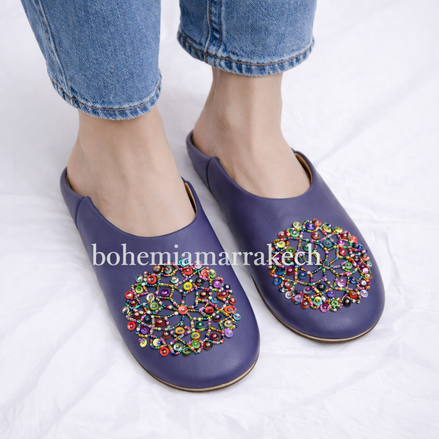 Minimalist handmade Moroccan leather babouche slippers for indoor wear.