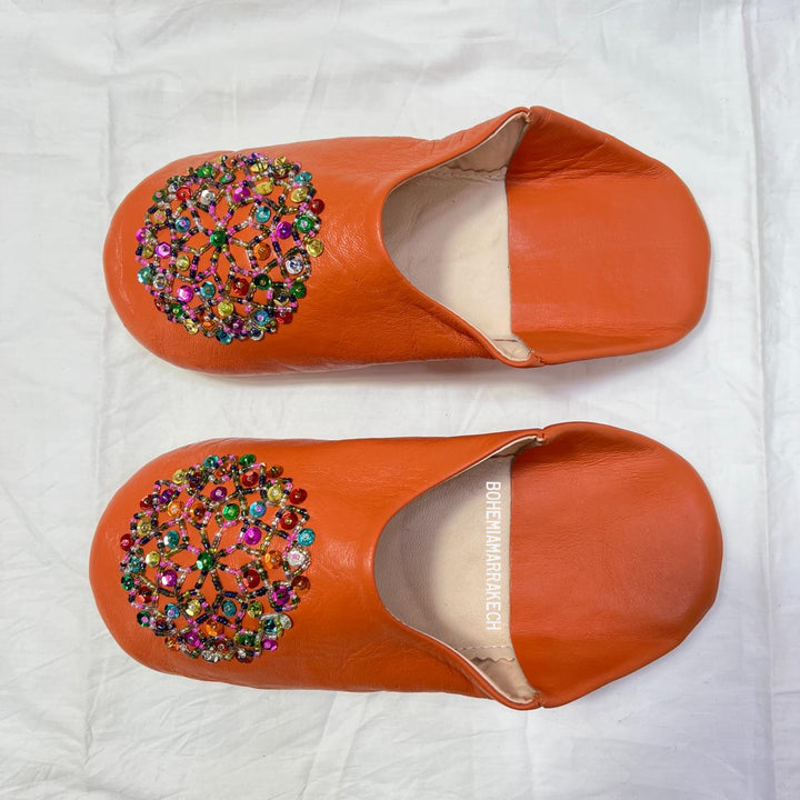 Handcrafted leather Moroccan babouche slippers in a classic pointed design.