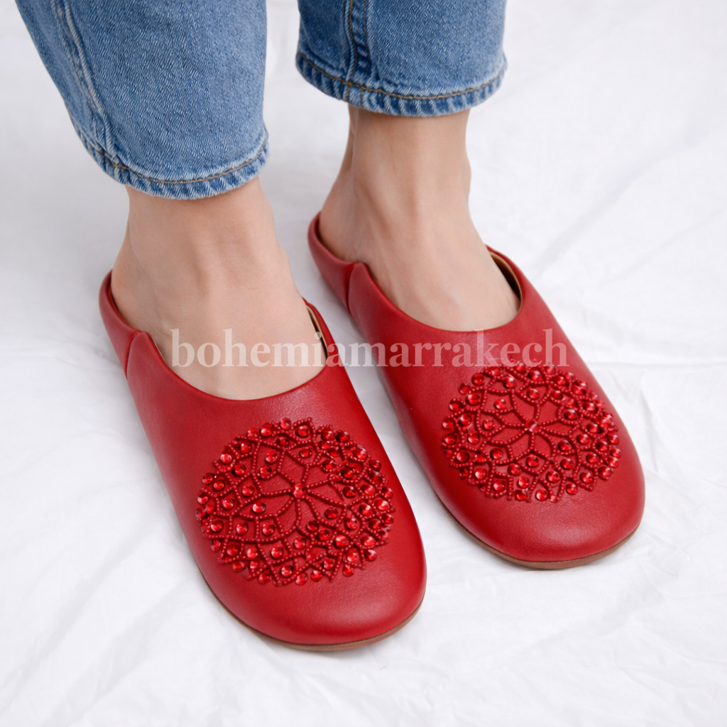 Artisan-made Moroccan babouche slippers with simple stitched details.