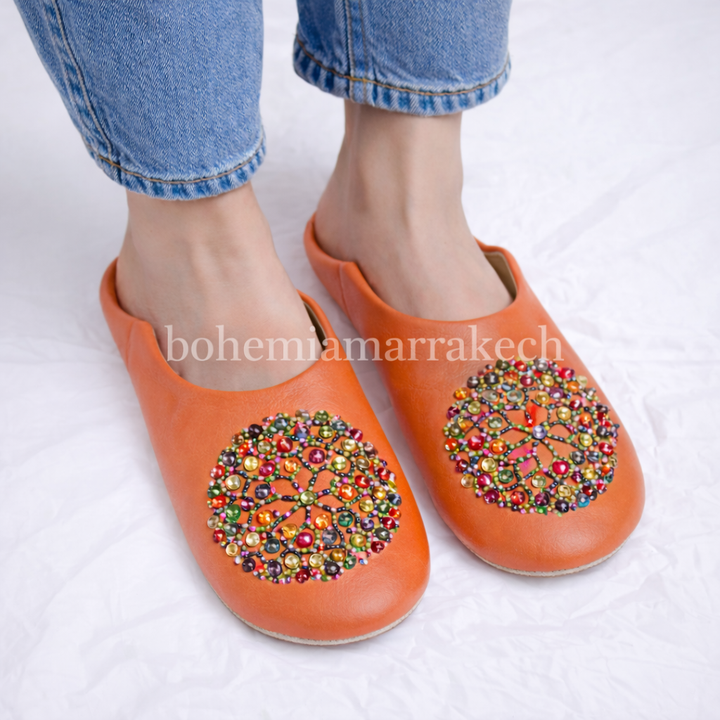 Handcrafted leather Moroccan babouche slippers in a classic pointed design.