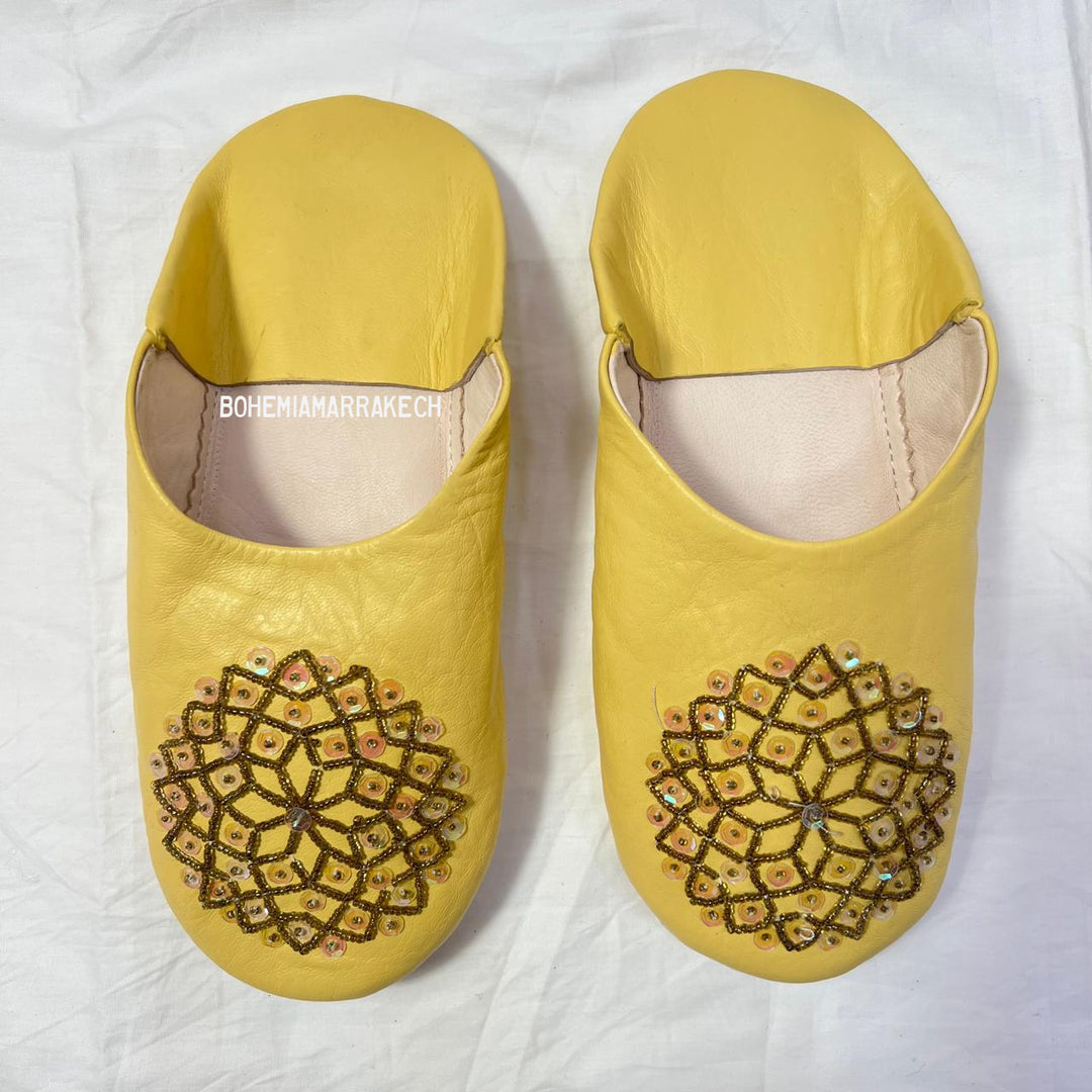 Artisan-made Moroccan babouche slippers for indoor wear.