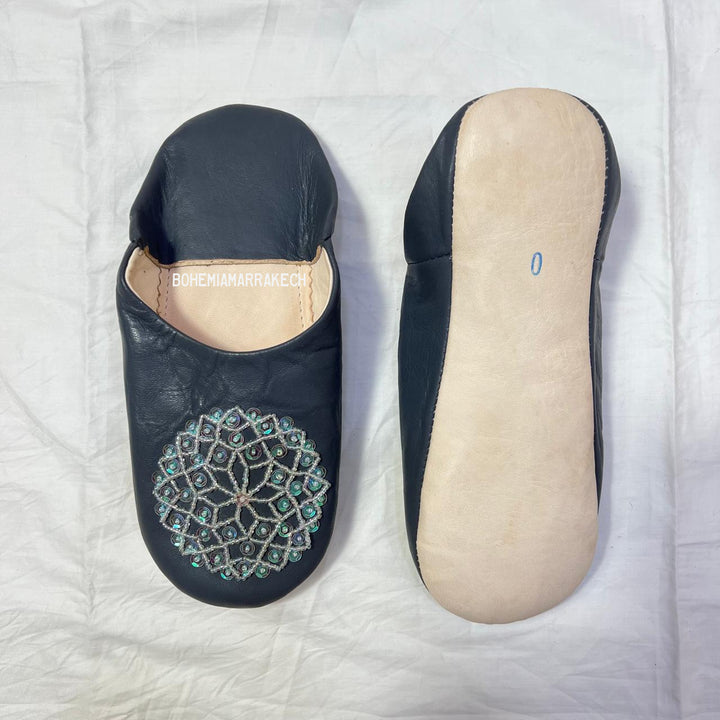 Handcrafted leather Moroccan babouche slippers in a classic pointed design.