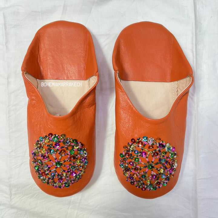 Handcrafted leather Moroccan babouche slippers in a classic pointed design.