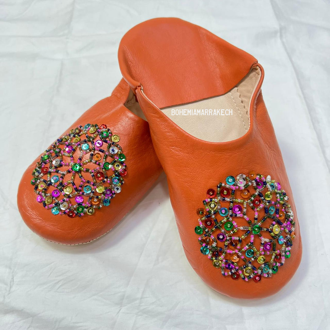 Handcrafted leather Moroccan babouche slippers in a classic pointed design.