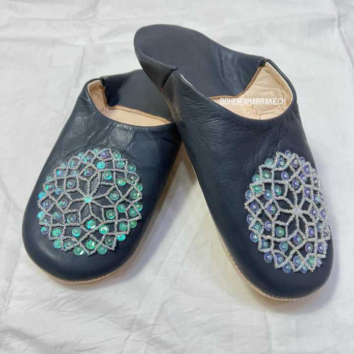 Handcrafted leather Moroccan babouche slippers in a classic pointed design.