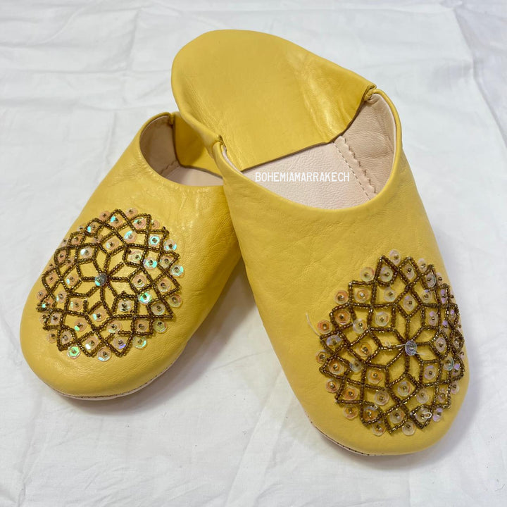 Artisan-made Moroccan babouche slippers for indoor wear.