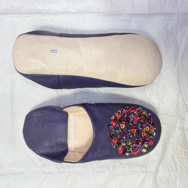 “Minimalist handmade Moroccan leather babouche slippers for indoor wear.”