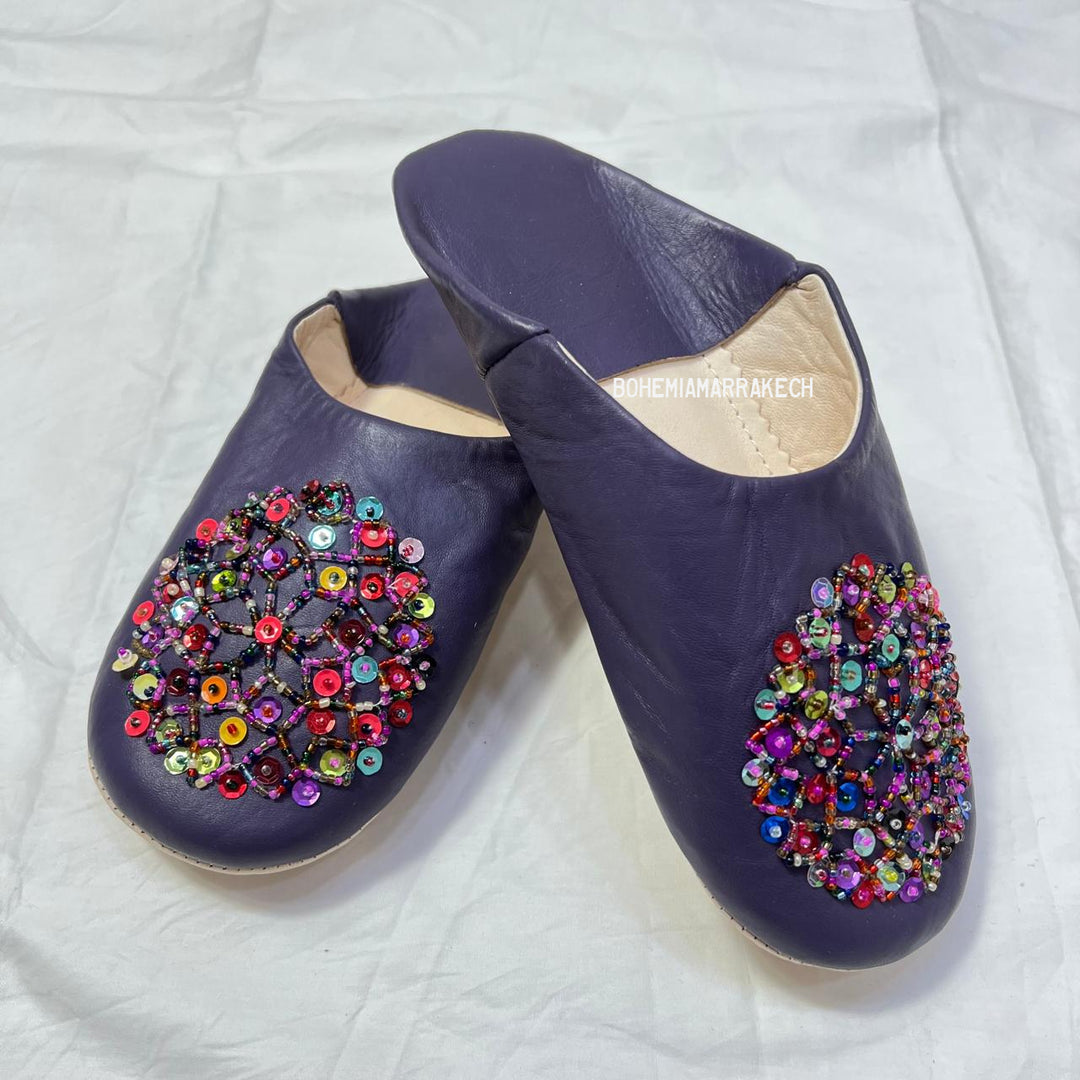 “Minimalist handmade Moroccan leather babouche slippers for indoor wear.”