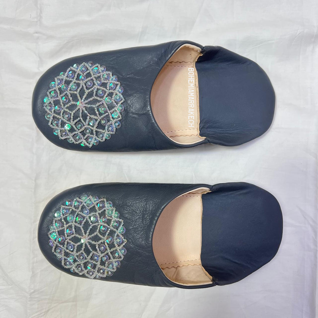 Handcrafted leather Moroccan babouche slippers in a classic pointed design.