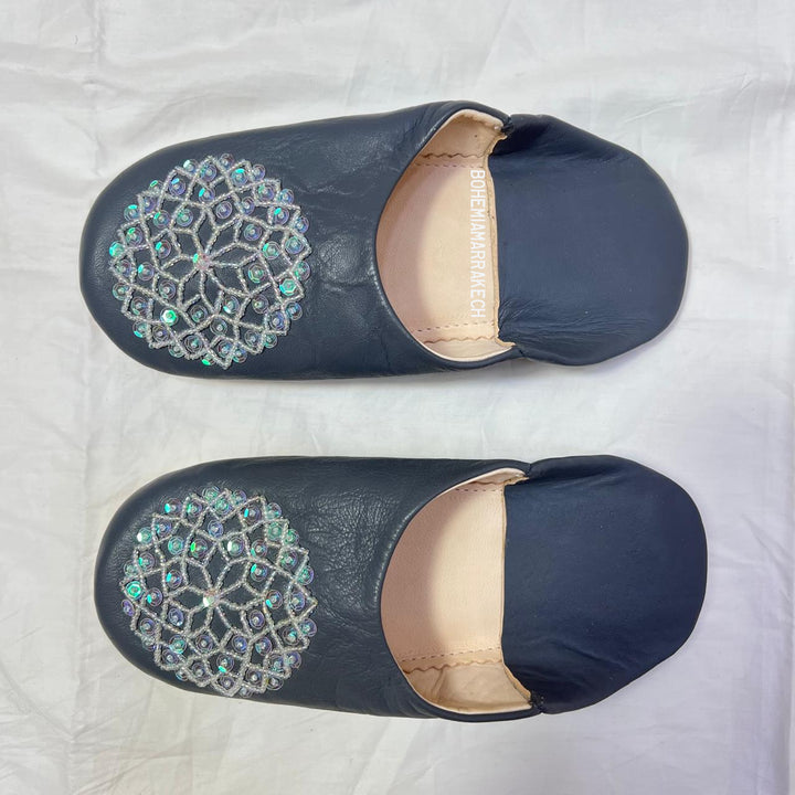 Handcrafted leather Moroccan babouche slippers in a classic pointed design.