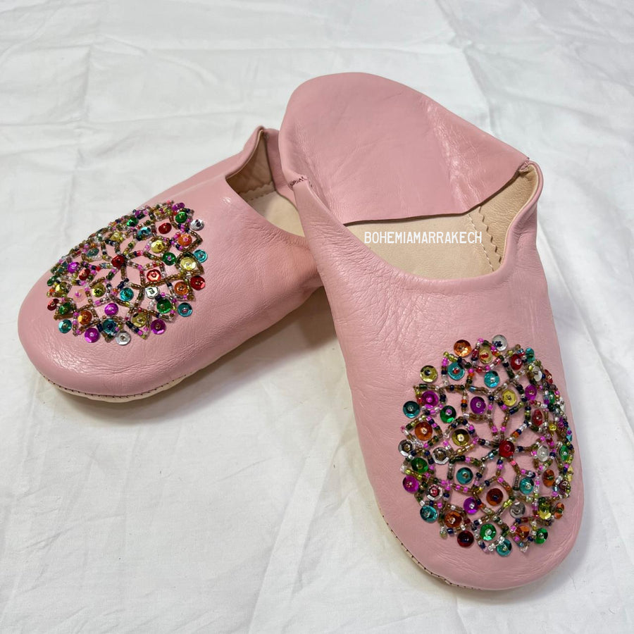 Traditional pointed Moroccan babouche slippers made from natural leather.
