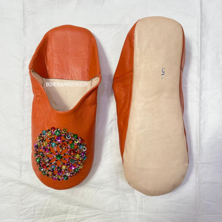 Handcrafted leather Moroccan babouche slippers in a classic pointed design.
