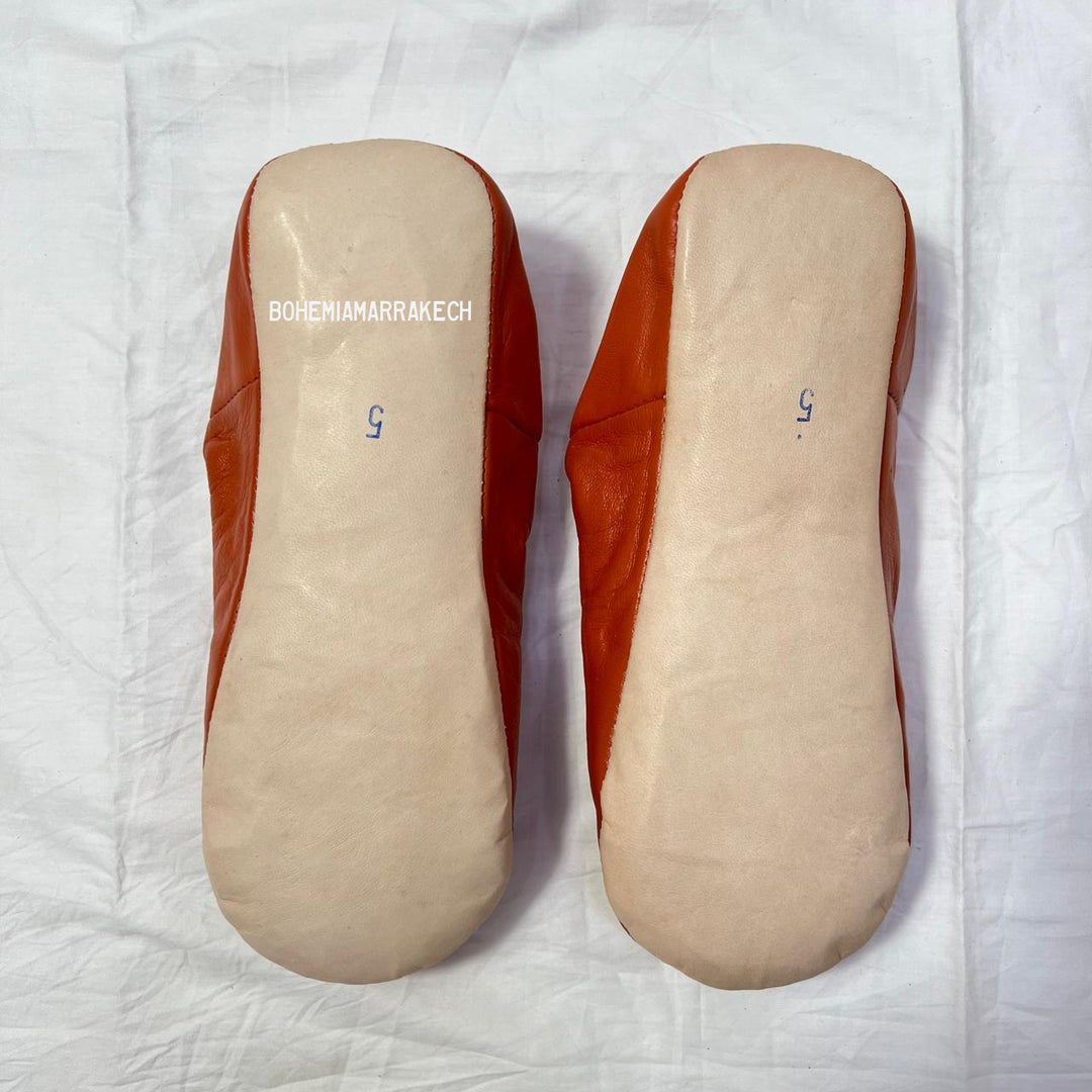Handcrafted leather Moroccan babouche slippers in a classic pointed design.
