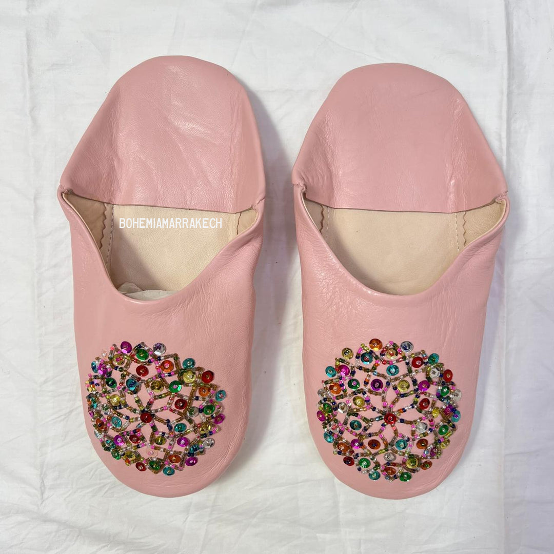 Traditional pointed Moroccan babouche slippers made from natural leather.