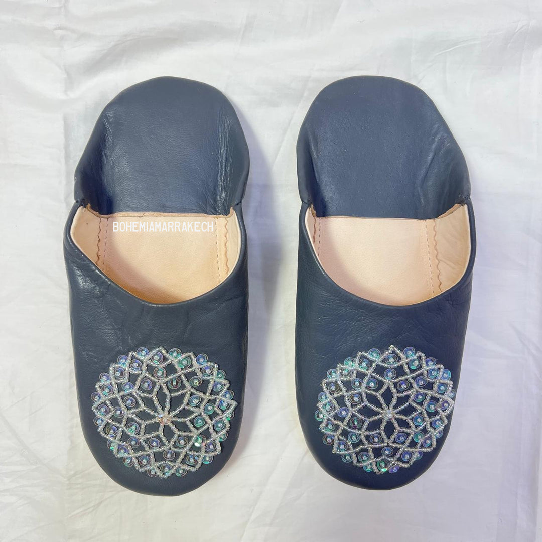 Handcrafted leather Moroccan babouche slippers in a classic pointed design.