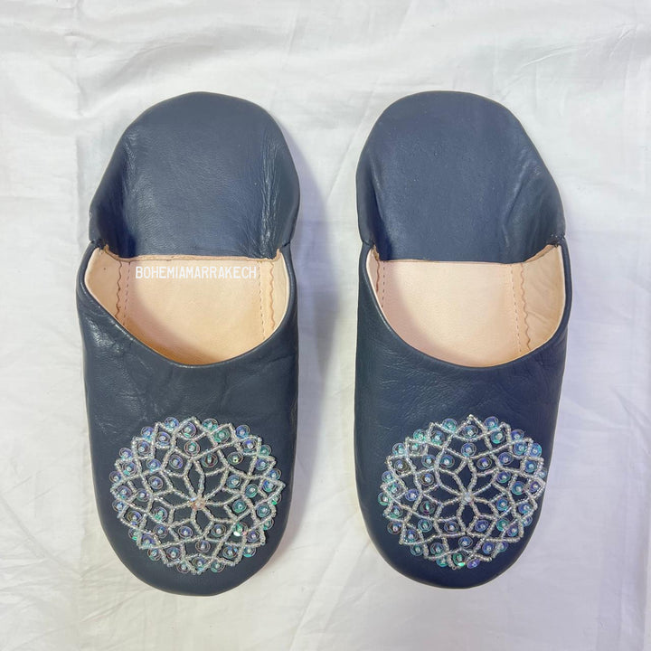 Handcrafted leather Moroccan babouche slippers in a classic pointed design.