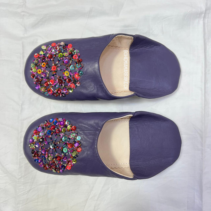 “Minimalist handmade Moroccan leather babouche slippers for indoor wear.”