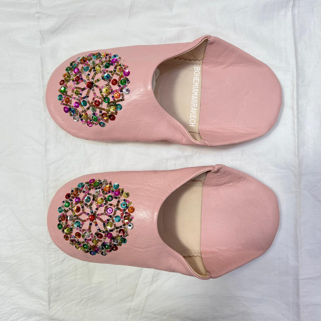 Traditional pointed Moroccan babouche slippers made from natural leather.