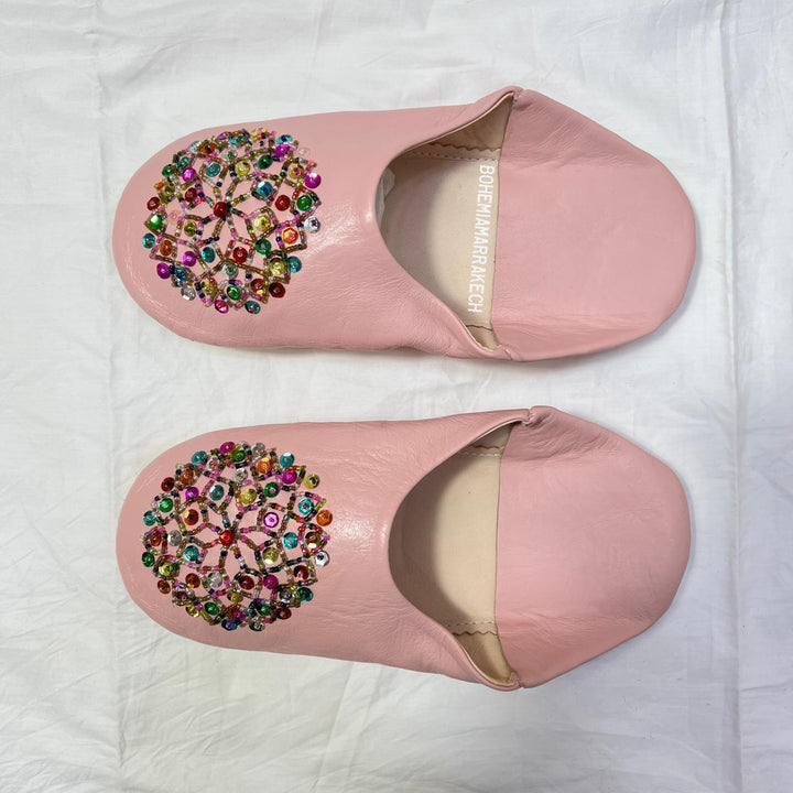 Traditional pointed Moroccan babouche slippers made from natural leather.