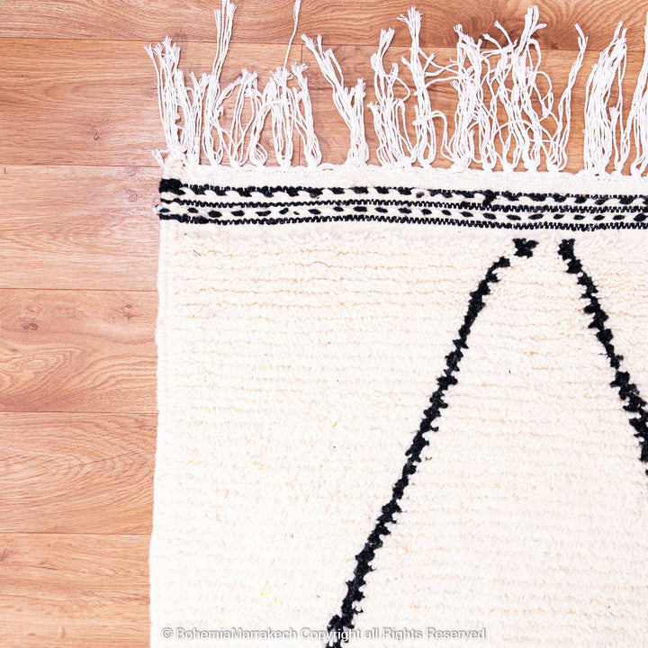 Black and white handmade Moroccan runner rug with diamond pattern in Beni Ourain wool style