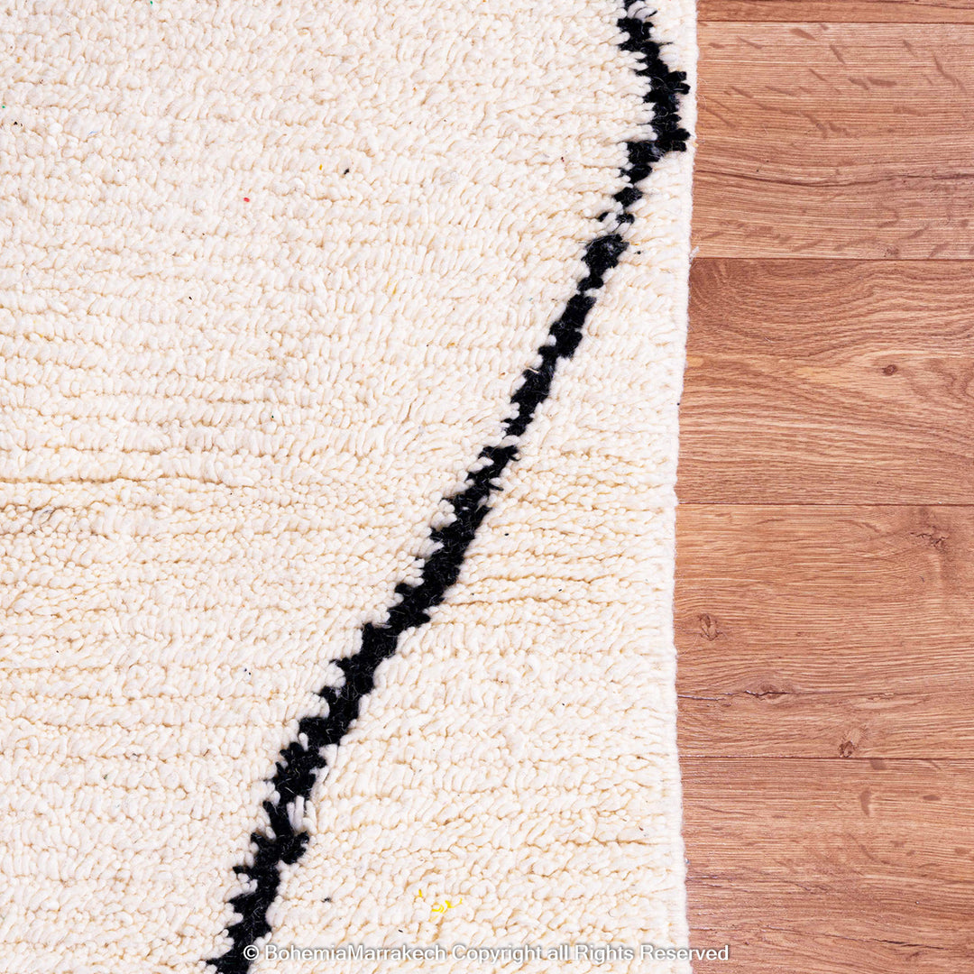 Black and white handmade Moroccan runner rug with diamond pattern in Beni Ourain wool style
