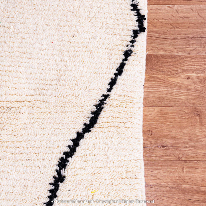 Black and white handmade Moroccan runner rug with diamond pattern in Beni Ourain wool style