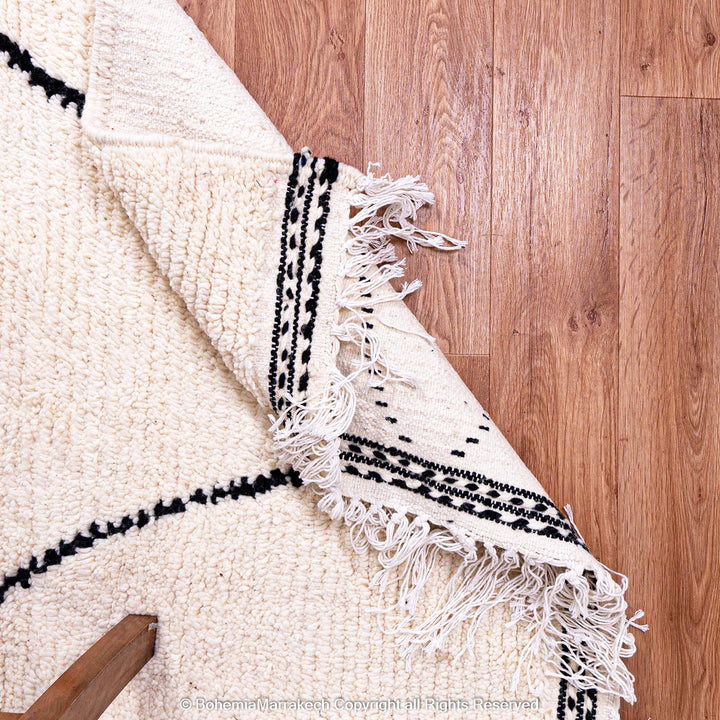 Black and white handmade Moroccan runner rug with diamond pattern in Beni Ourain wool style