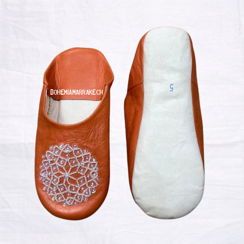 Handmade orange Moroccan babouche slippers in genuine leather with embroidered geometric design