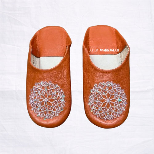 Handmade orange Moroccan babouche slippers in genuine leather with embroidered geometric design