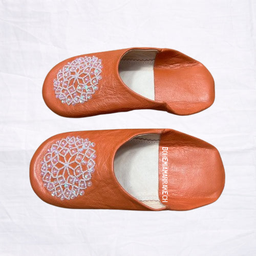 Handmade orange Moroccan babouche slippers in genuine leather with embroidered geometric design