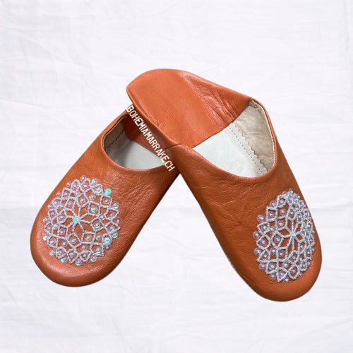 Handmade orange Moroccan babouche slippers in genuine leather with embroidered geometric design