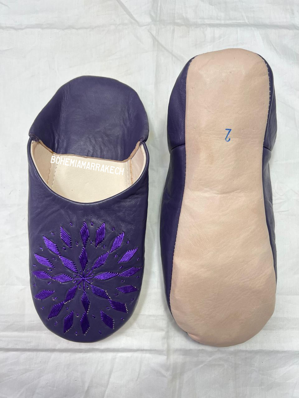 Handmade purple Moroccan leather babouche slippers with hand-embroidered floral design