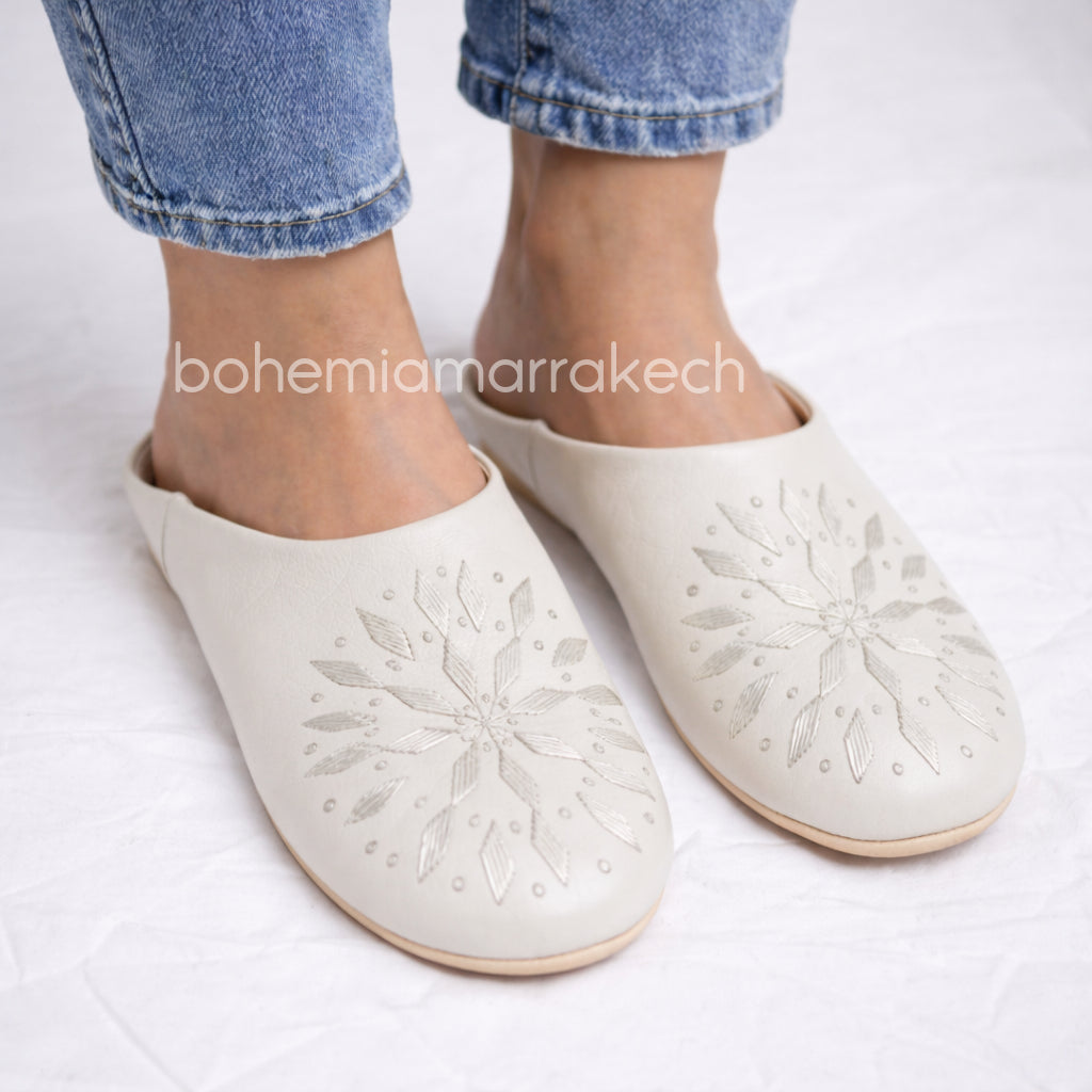 Hand-stitched ivory Moroccan leather babouche slippers with carved geometric design