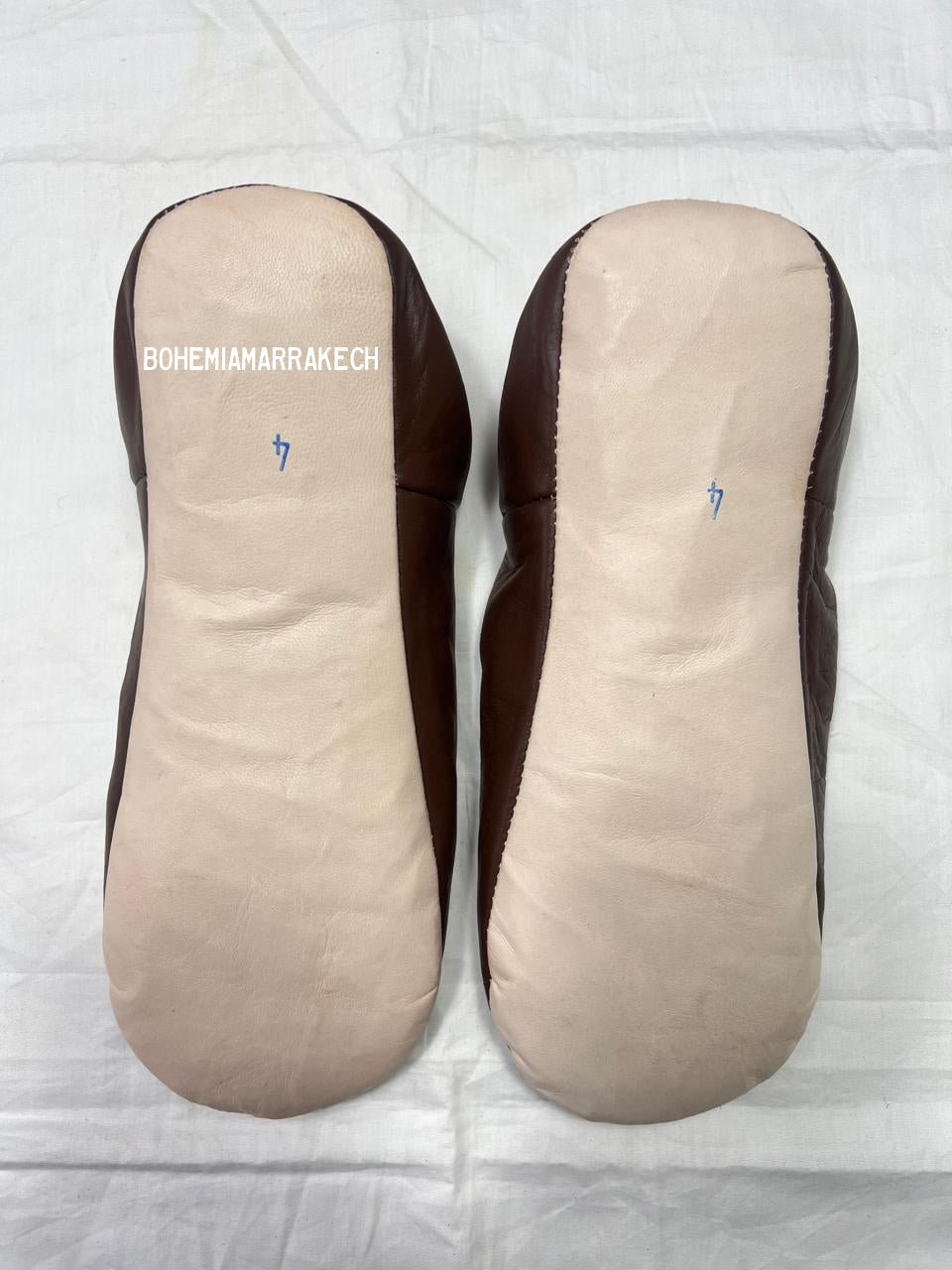 Handmade brown Moroccan leather babouche slippers with hand-carved geometric mandala design