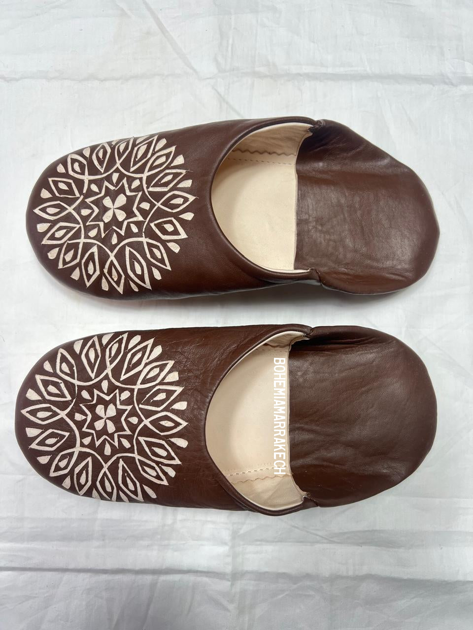 Handmade brown Moroccan leather babouche slippers with hand-carved geometric mandala design
