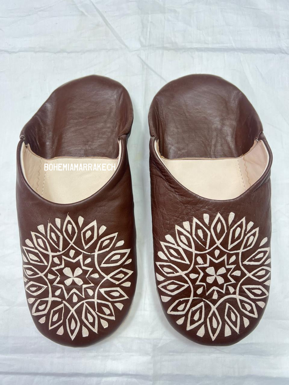 Handmade brown Moroccan leather babouche slippers with hand-carved geometric mandala design