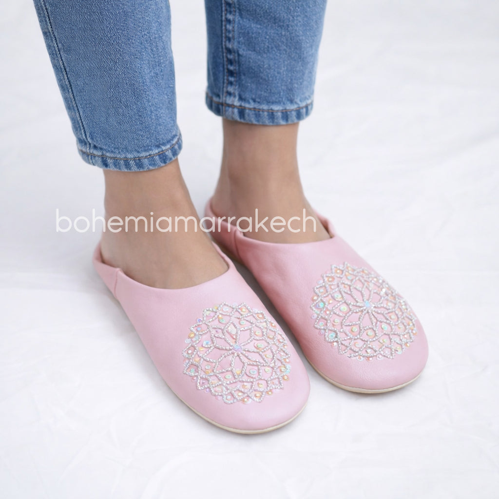 Pink Moroccan babouche slippers handmade in leather with beaded and embroidered geometric design.