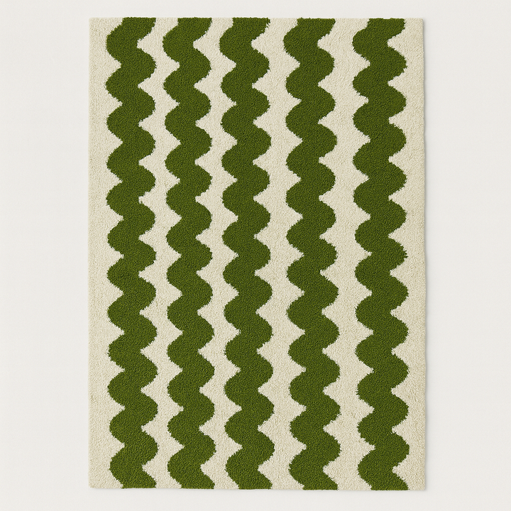Green and beige zigzag patterned rug on a plain background