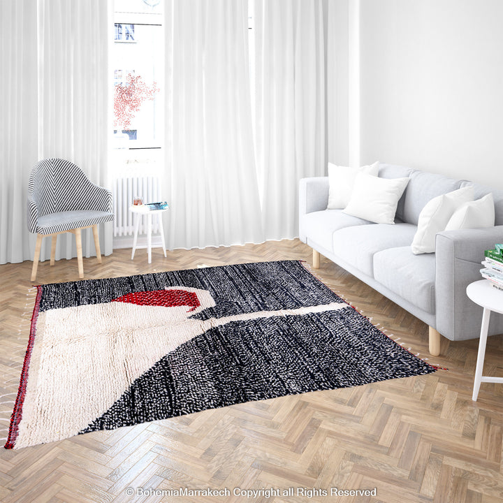 Handmade Moroccan runner rug featuring a traditional Berber symbol in red and black wool