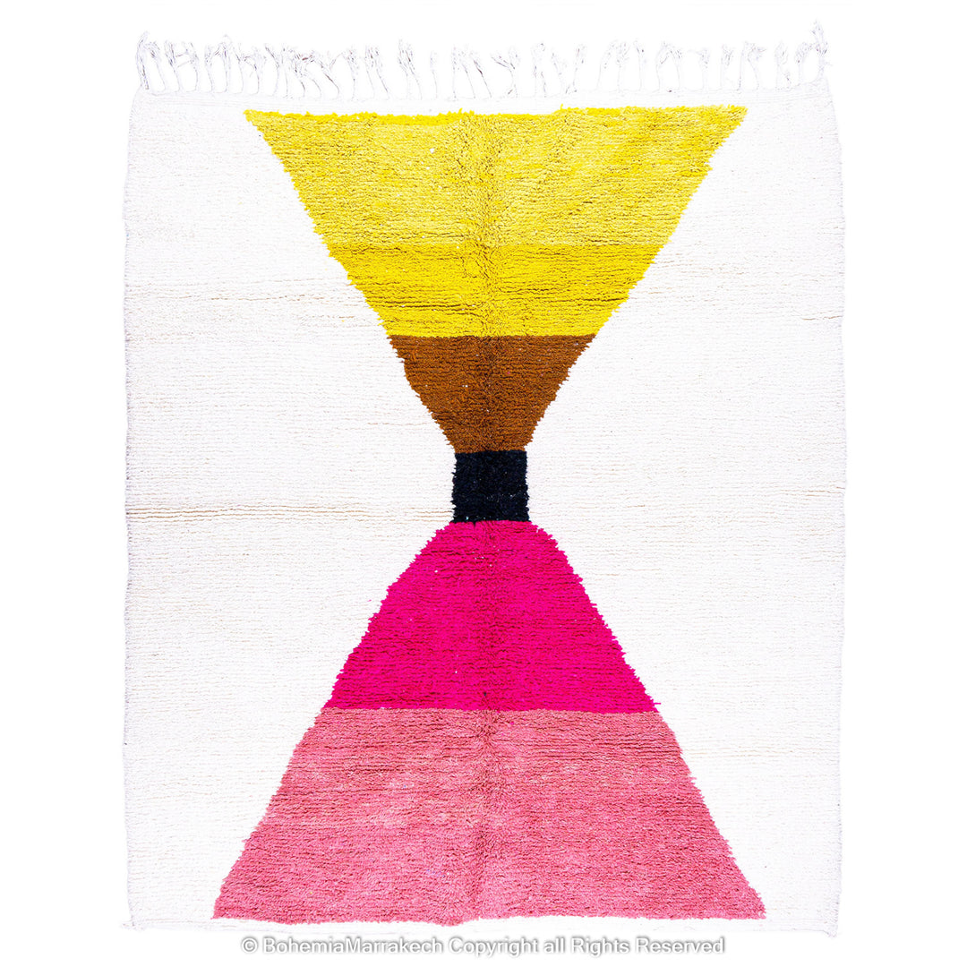 Handmade Moroccan shag rug with yellow and pink abstract hourglass design in Beni Ourain wool style