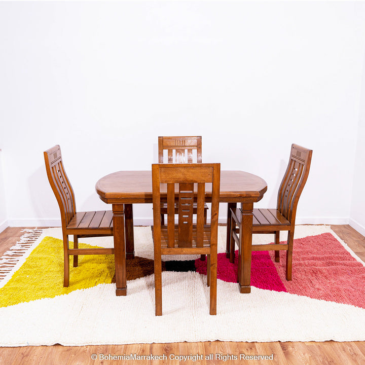 Handmade Moroccan shag rug with yellow and pink abstract hourglass design in Beni Ourain wool style