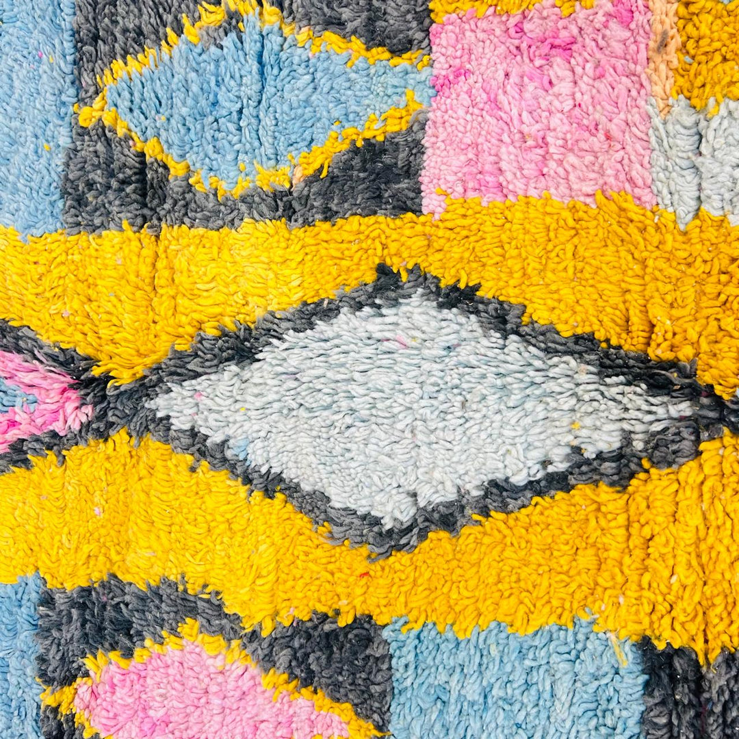 Vintage Moroccan wool rug with colorful Berber geometric pattern, handmade in Morocco