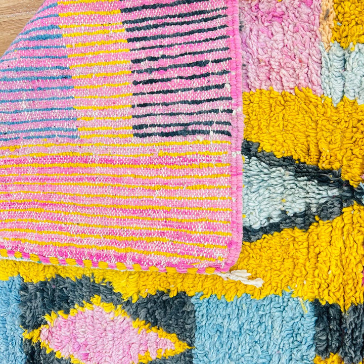 Vintage Moroccan wool rug with colorful Berber geometric pattern, handmade in Morocco
