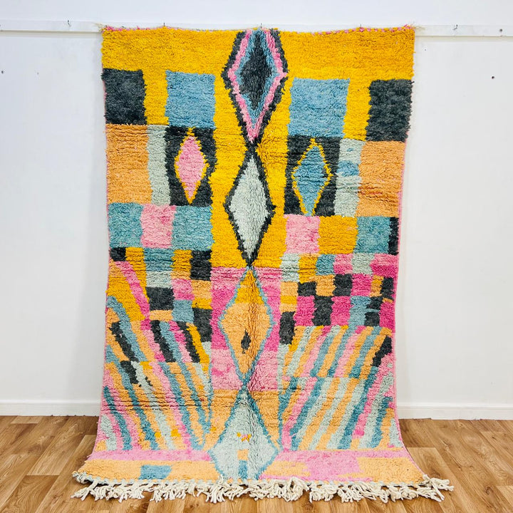 Vintage Moroccan wool rug with colorful Berber geometric pattern, handmade in Morocco
