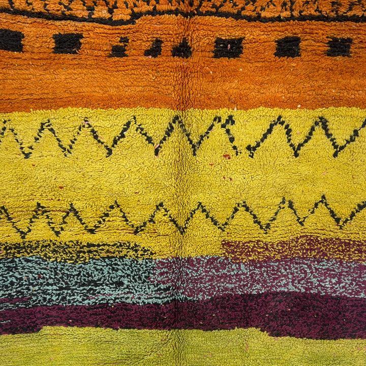 small vintage moroccan wool rug with yellow orange green stripes and berber tribal patterns handmade shag rug