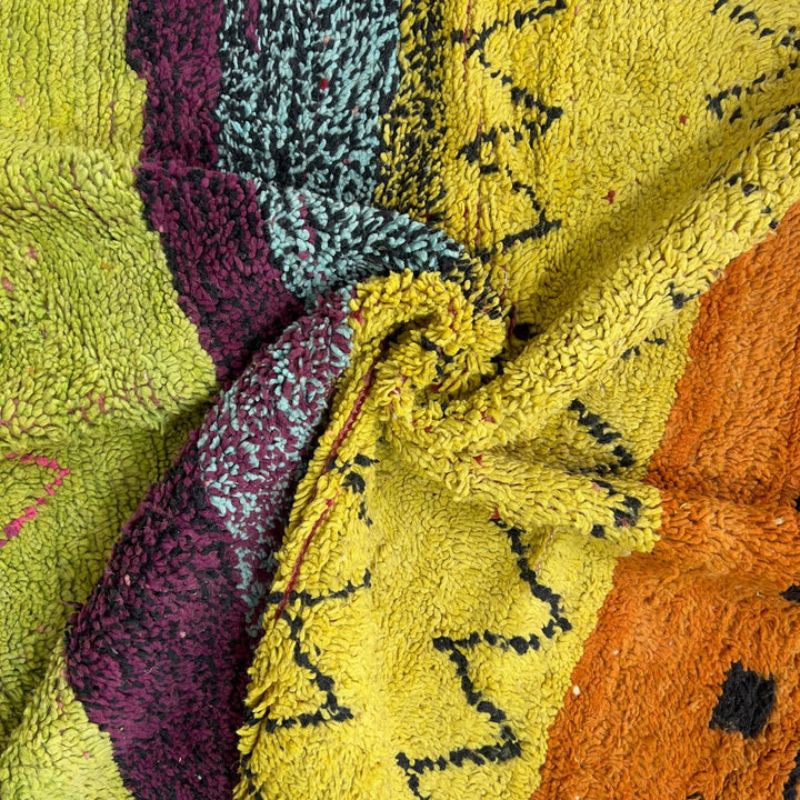 small vintage moroccan wool rug with yellow orange green stripes and berber tribal patterns handmade shag rug