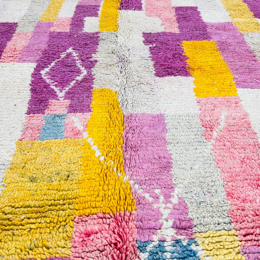 Vintage Moroccan wool rug with colorful geometric Berber design, handmade in Morocco